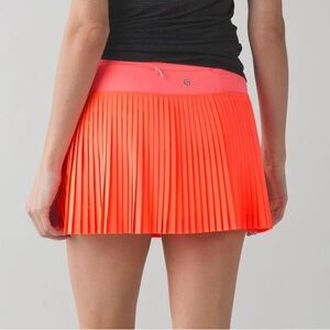 Lululemon 6 Pleat To Street Skirt II in Grapefruit Neon Pink Orange
